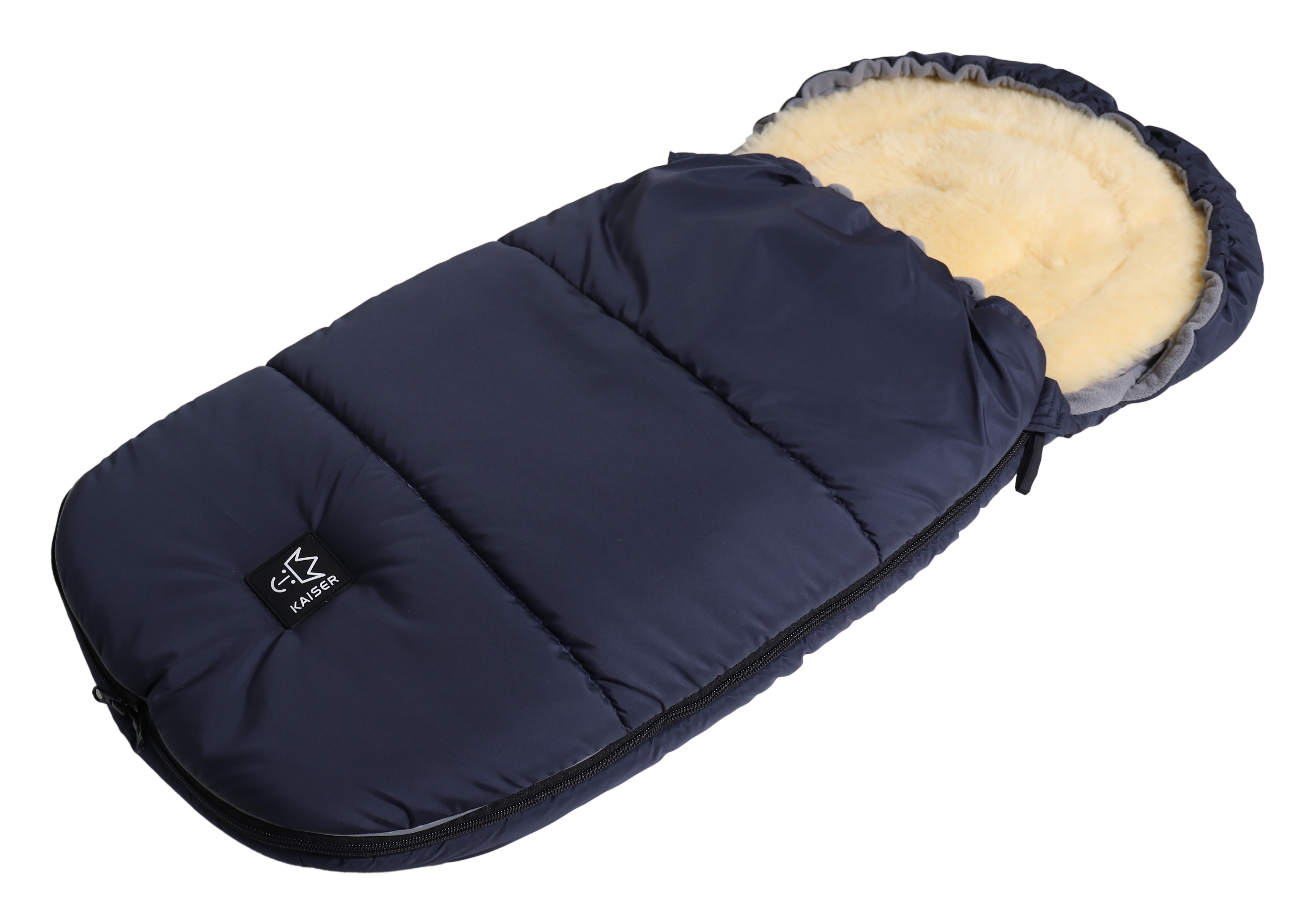 Thermofußsack aus Fleece in der Farbe navy mit herausnehmbarer Schaffelleinlage liegt quer
